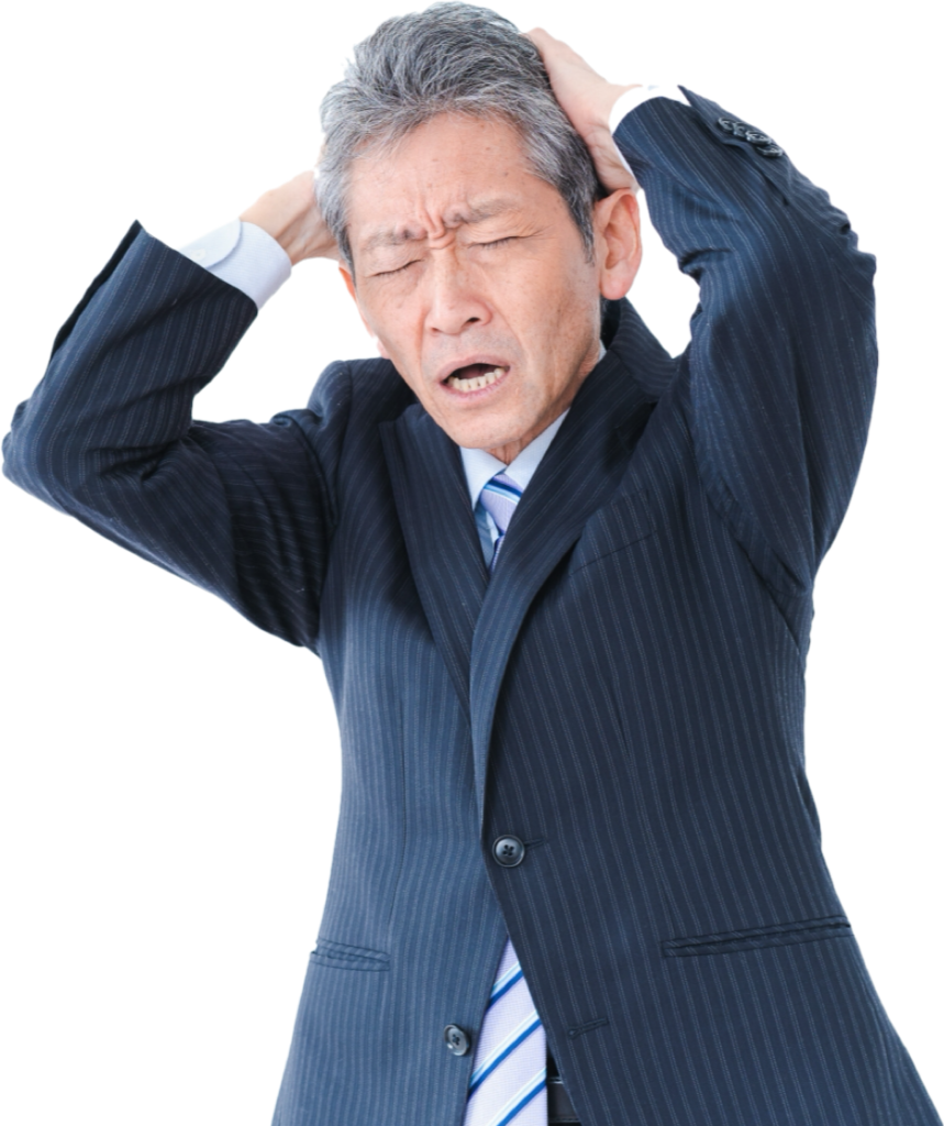 頭を抱える高齢者